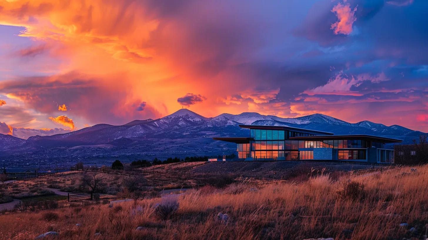 a stunning modern custom home, showcasing sleek architectural lines and large glass windows, nestled against the backdrop of the majestic denver mountains under a vibrant sunset sky.